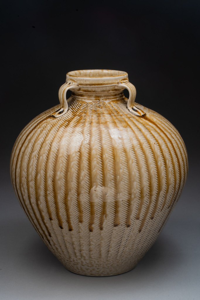 Wood-fired case with ash glaze